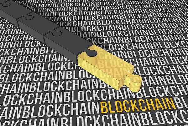 Blockchain word pattern with a gold key highlight