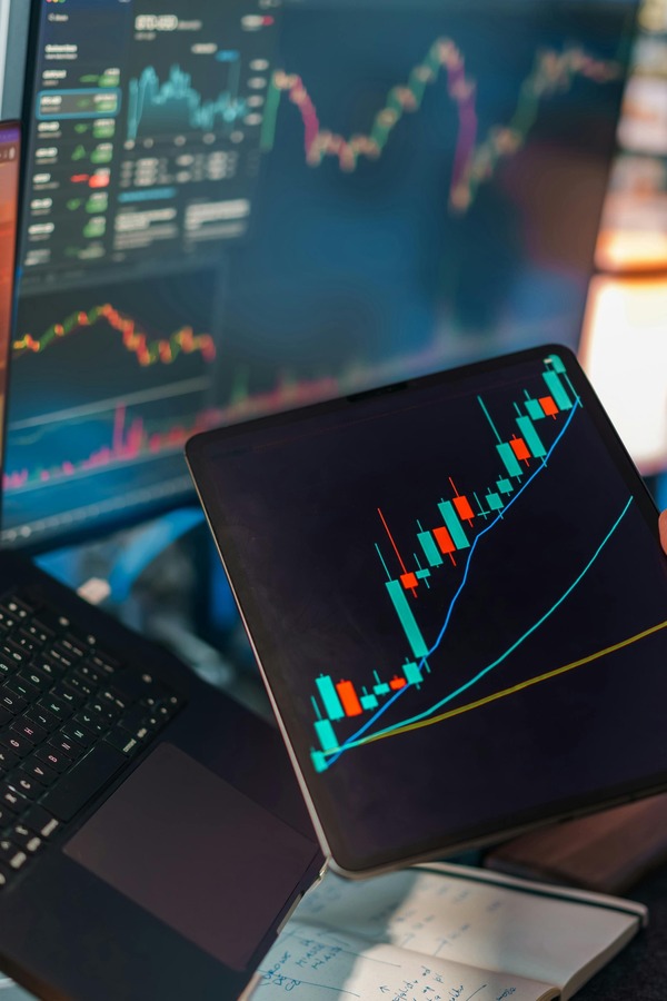 Laptop showing cryptocurrency price charts