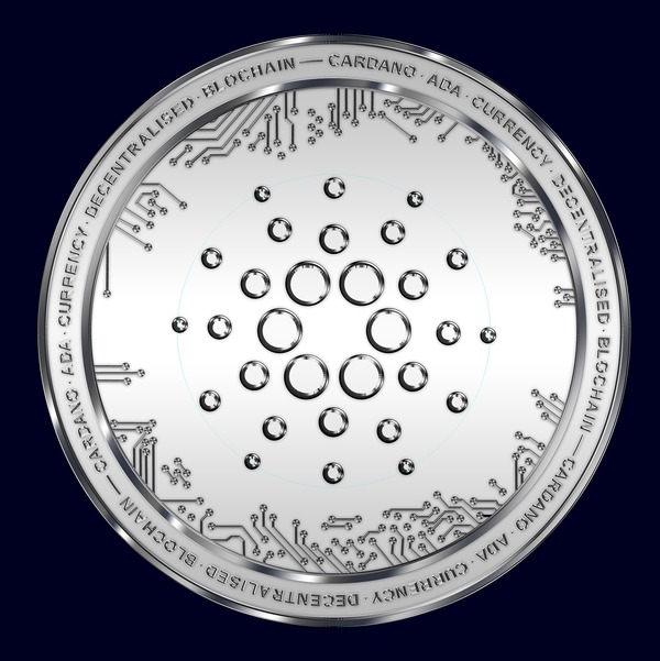 Silver Cardano coin on a dark background