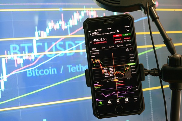 Smartphone showing a BTC/USDT chart