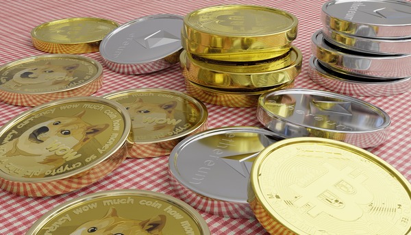 Stacks of gold and silver coins on a tablecloth